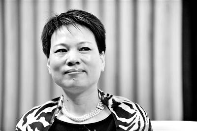 周晓光曾被誉为“中国最励志的女企业家”供图/视觉中国