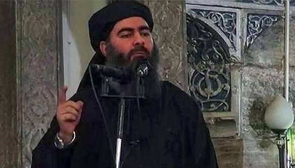资料图片：“伊斯兰国”极端武装头目巴格达迪视频截图。（图片来源于网络）