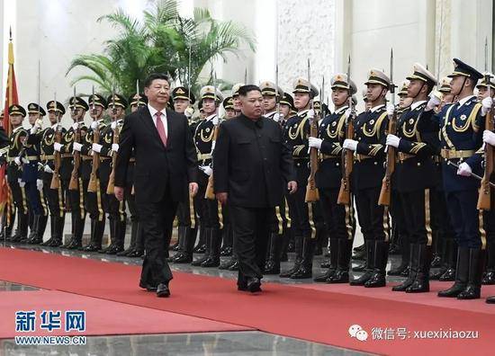 会谈前，习近平在人民大会堂北大厅为金正恩举行欢迎仪式。新华社记者申宏摄