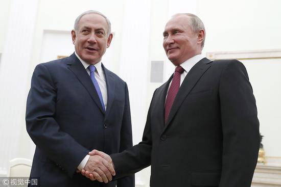 以色列总理内塔尼亚胡与俄罗斯总统普京。（视觉中国）