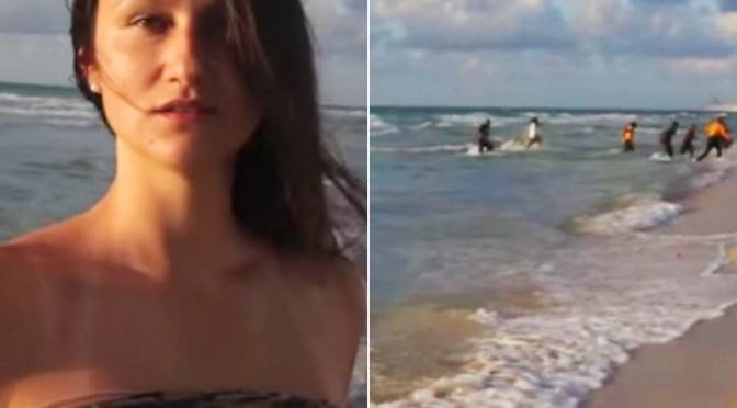 美国女模特儿沙滩录影拍到背后偷渡客抢滩
