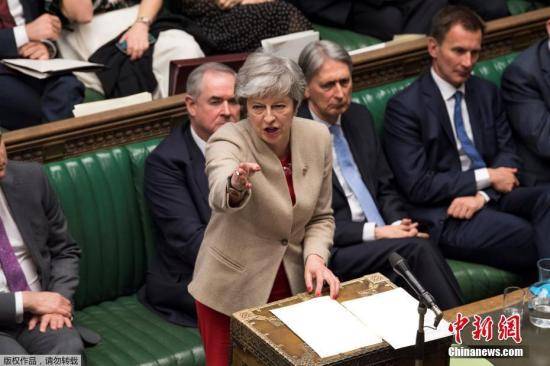 资料图：英国首相特蕾莎·梅在议会。