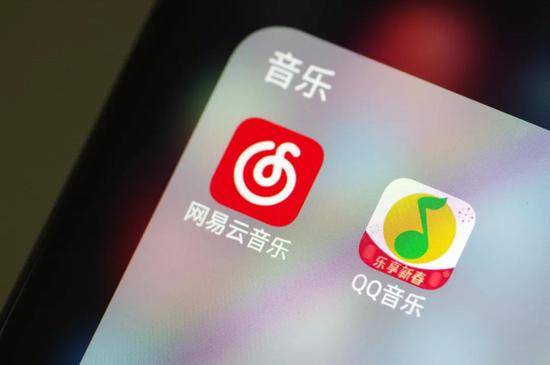 腾讯音乐、网易云音乐要挣钱 得先争版权