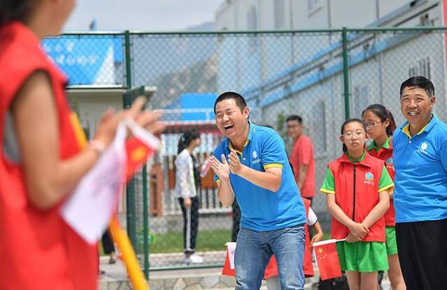 冬奥工地赛地壶奥林匹克日参与运动助力冬奥