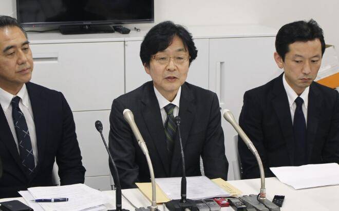 日本“7-11”公司社长出席新闻发布会。（图：共同社）