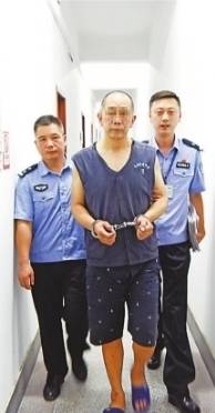 民警接力追凶21年终擒疑犯