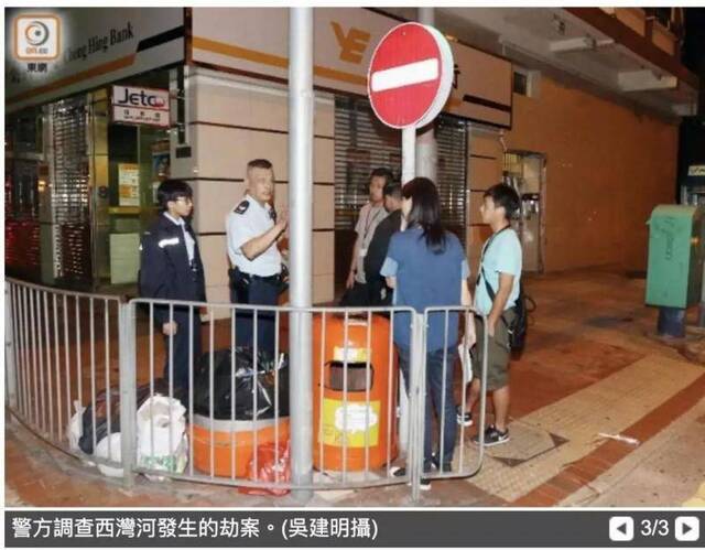 港媒：内地游客被4名黑衣人当街殴打 被抢走1万多