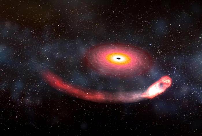这张艺术家的想象图描绘出黑洞吞噬中子星的情景。中子星绕着黑洞旋转，黑洞巨大的重力将中子星撕成碎片，这种现象称为「潮汐力崩解」（tidal disruption