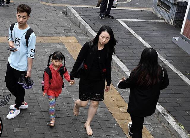 降雨降温添衣保暖未来三天北京最低气温不足20℃