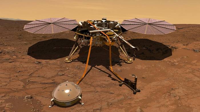 这张插图绘制了安放在火星表面的洞察号登陆器。登陆器磁力计所获得的初步数据显示，这颗红色星球的磁场会在夜晚以无法解释的方式摇摆。 ILLUSTRATION BY