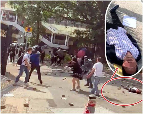 13日，一位七旬老人被暴徒投掷硬物击中头部倒地（图片来源：香港《星岛日报》）
