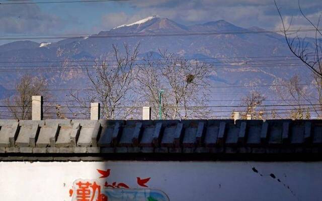 京北现“海坨戴雪”美景 里炮村村民天天见