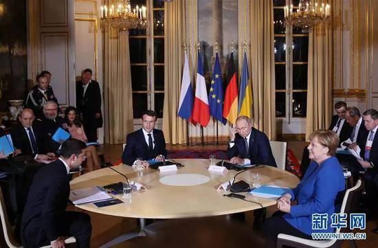  12月9日，在法国巴黎，乌克兰总统泽连斯基、法国总统马克龙、俄罗斯总统普京和德国总理默克尔出席“诺曼底模式”四国峰会。（图源：新华网）