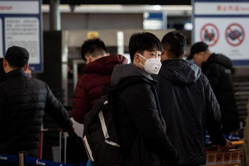 探访首都机场：旅客自备口罩，安检人员称未收到防控通知