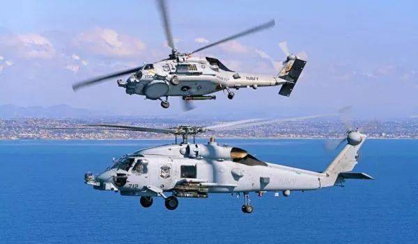 ▲资料图片：美海军MH-60R多用途舰载直升机编队飞行。（美海军官网）