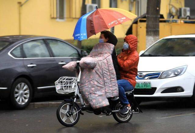 北京傍晚降小雨 明晚最低气温重回冰点之下 组图