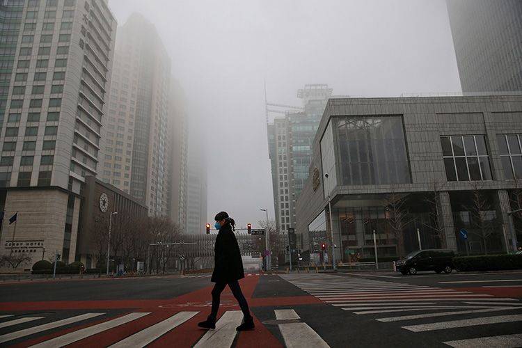 组图  晨雾锁京城 部分地区能见度小于500米