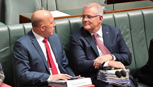 澳大利亚内政部长彼得·达顿（左）与总理莫里森图片来源：AAP