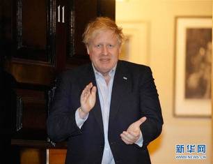 新华社发，英国首相府供图