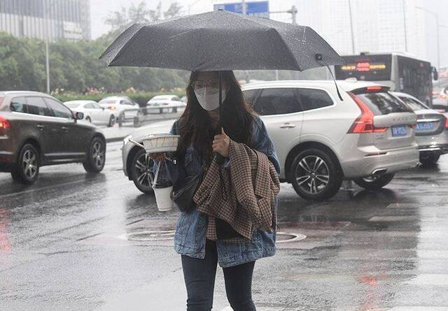 北京降雨中午前后结束，明天气温开始回升 组图