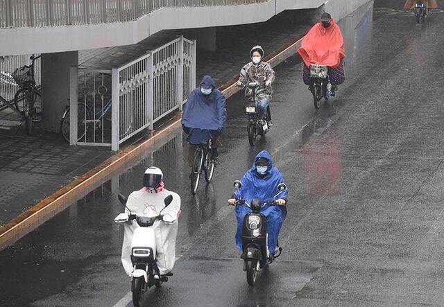 北京降雨中午前后结束，明天气温开始回升 组图