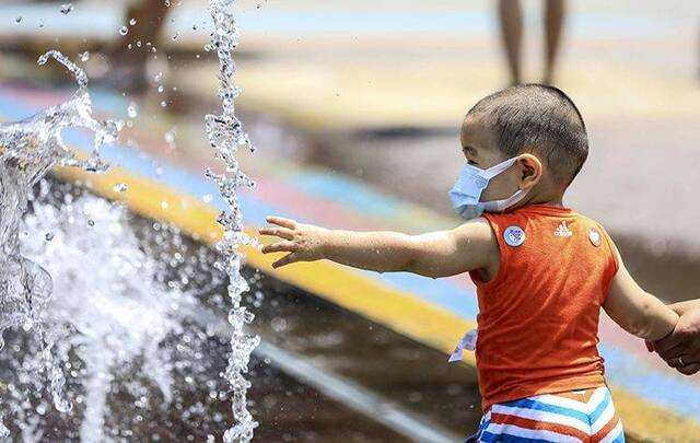 北京持续晴晒明后两天最高气温均在35℃以上组图