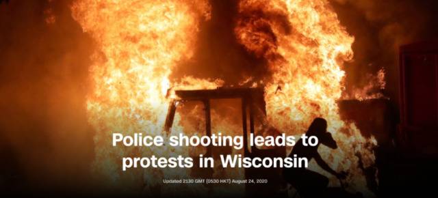 “威斯康星州警察枪击（黑人）引发抗议”。/CNN网站截图
