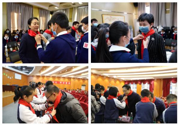 活动伊始,由两地少年队员为与会领导献红领巾。上方两图为北京会场,下方为西昌会场。