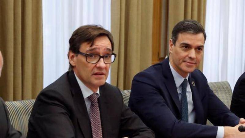 △西班牙卫生部长（左）及首相（右）