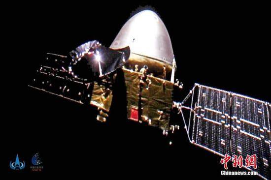 资料图：中国国家航天局发布的中国首次火星探测任务天问一号探测器飞行图像。中新社发中国国家航天局供图