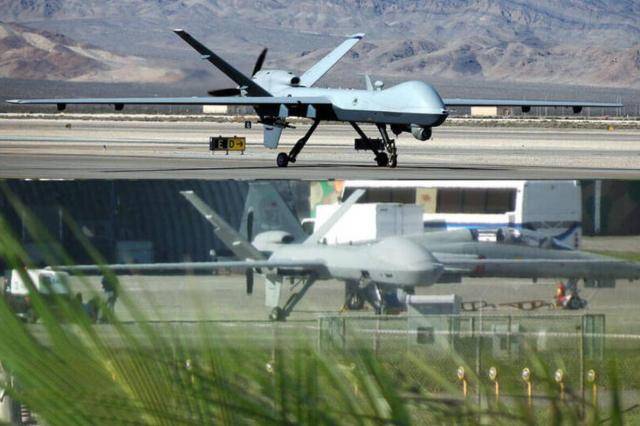 MQ-9系列无人机与下方的“腾云”无人机对比图，图自台媒