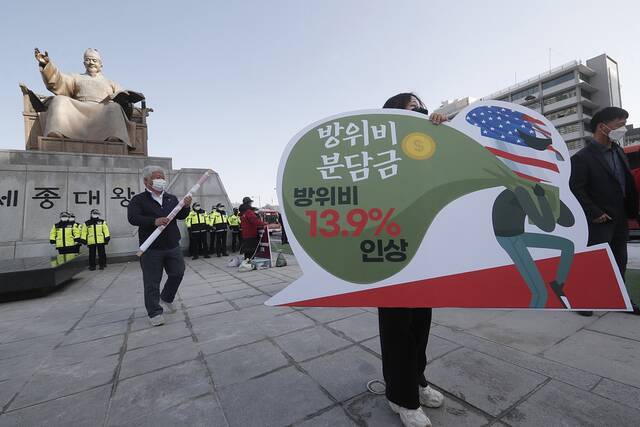 韩国民众抗议美国务卿来访