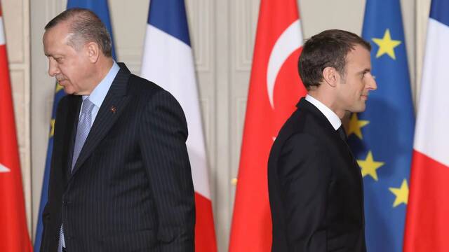 △土耳其总统埃尔多安（左）与法国总统马克龙（右）