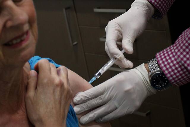 澳大利亚民众接种阿斯利康疫苗来源：人民视觉