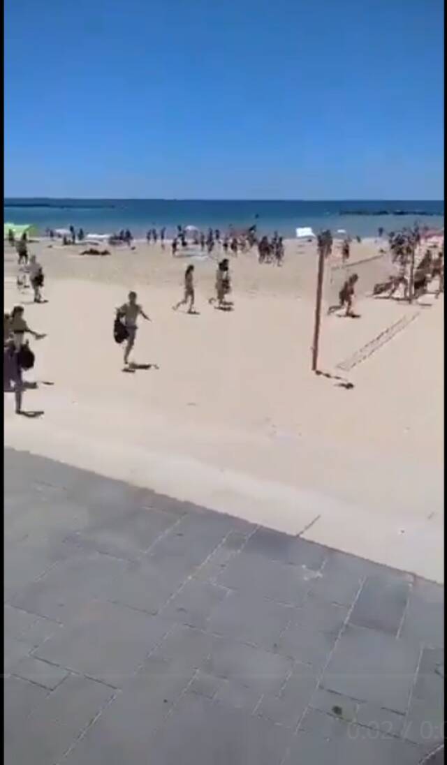 以色列特拉维夫海滩警报响起，游客四下逃散