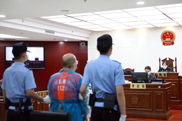 6月16日，北京市西城区人民法院对一起以办理京牌为幌子的诈骗案当庭宣判，图为庭审现场。西城法院供图