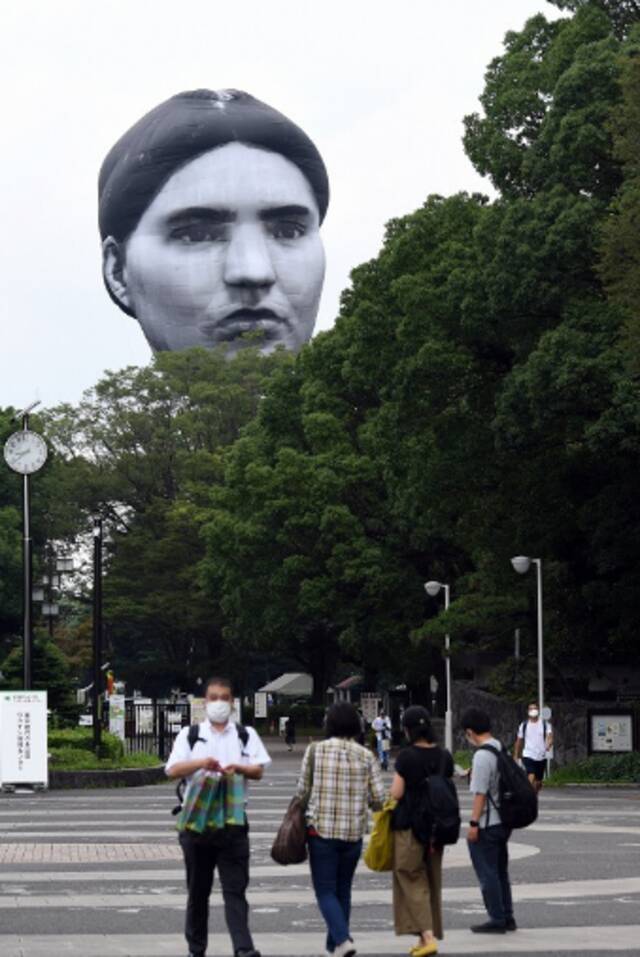 日本东京上空浮现神秘“大脸”（图片来源：日媒）