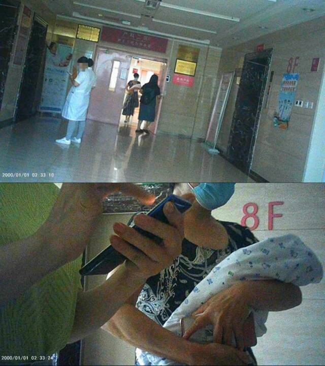 7月29日上午，在潍坊市妇幼保健院8楼，月嫂将男婴抱出拍照。