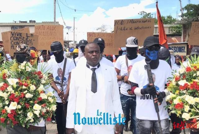 ▲17日，谢里齐埃在红桥纪念活动游行。图据海地新闻人报