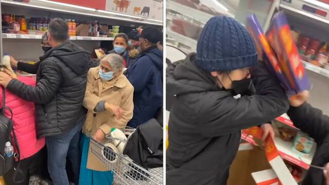英国一超市内顾客抢购特价商品起冲突 女子用披萨扇别人脸