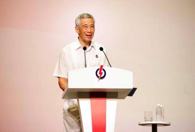 △新加坡总理李显龙在人民行动党大会上发表讲话（图片来源：新加坡《联合早报》）