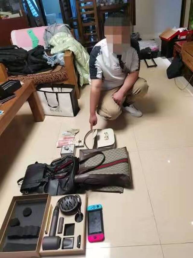 图④:被告人指认部分赃物