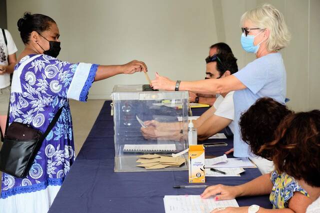 当地时间2021年12月12日，新喀里多尼亚首府努美阿，法国海外属地新喀里多尼亚正在举行第三次也是最后一次独立公投。人民视觉图
