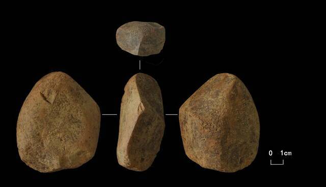 ↑太子陵旧石器时代遗址出土的磨制石器。（天津市文化遗产保护中心供图）