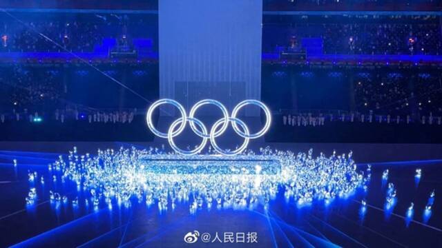 独具匠心！运动员走过巨大五环，“中国门”有多重含义