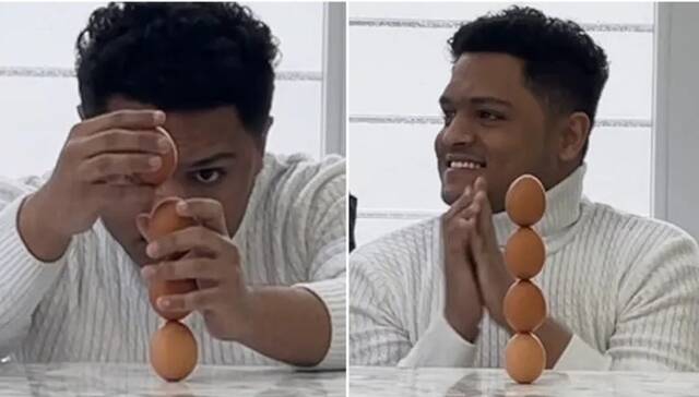 也门男子Mohammed Muqbel把4只鸡蛋垂直叠起刷新自己创下的旧有健力士世界纪录