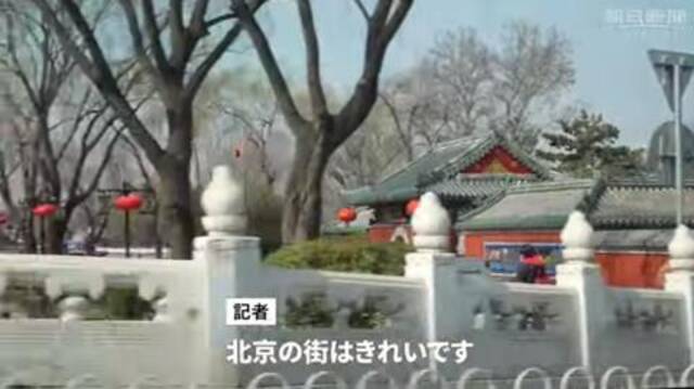 日本记者体验冬残奥会专车：北京街道真漂亮 和中国人交流很开心