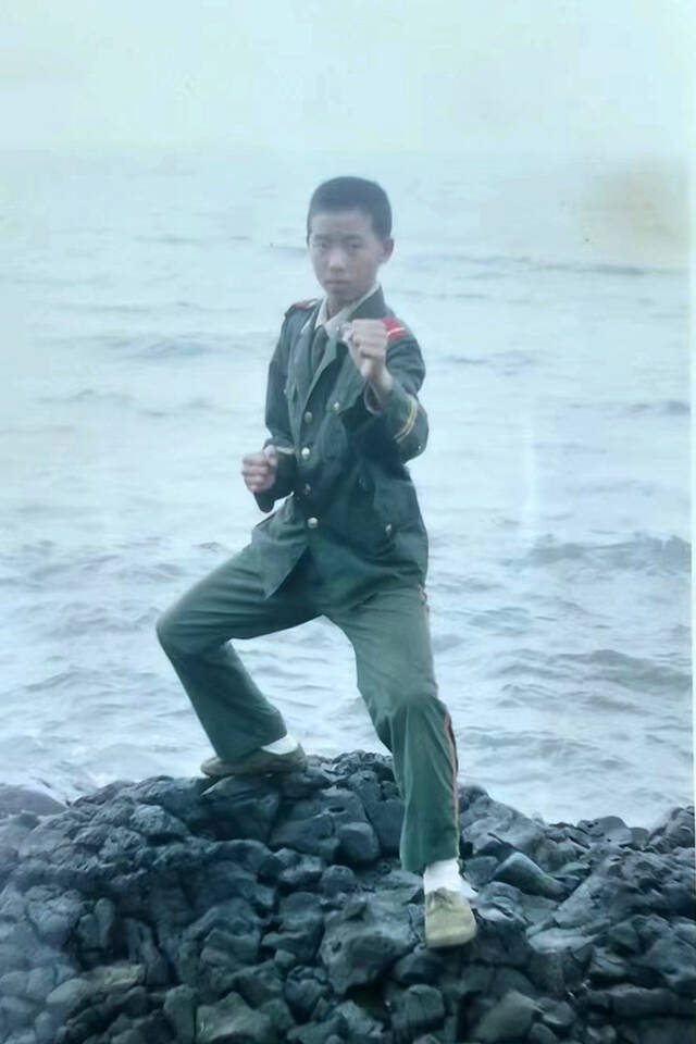 杨勇服役时的照片。