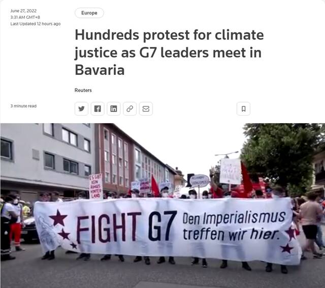 6月26日，德国加米施-帕滕基兴小镇，民众参加反对七国集团的示威游行。（来源：路透社报道截图）