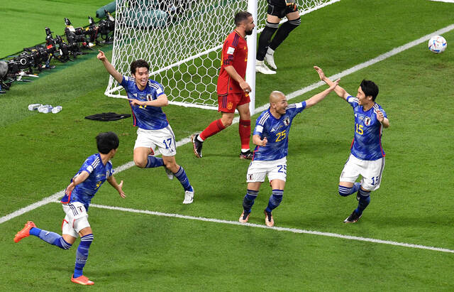 日本队庆祝进球图据视觉中国